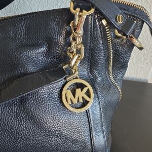 Michael Kors Black Leather Shoulder Bag with Gold Accents